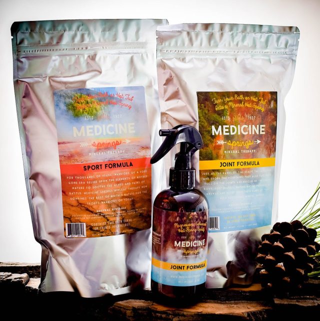 Two pouches of Medicine Springs product. These are the Joint Formula and Sport Formula mineral therapy with a spray bottle of Joint Formula